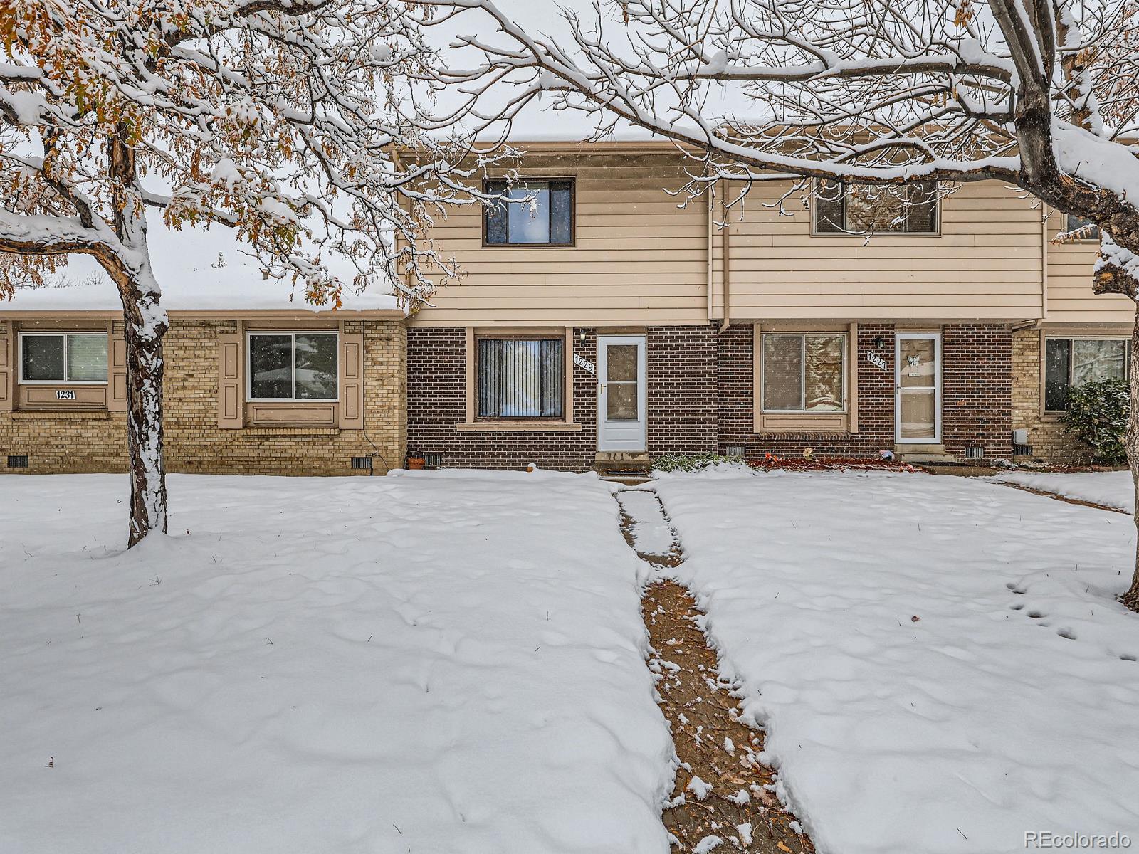 a front view of house with yard