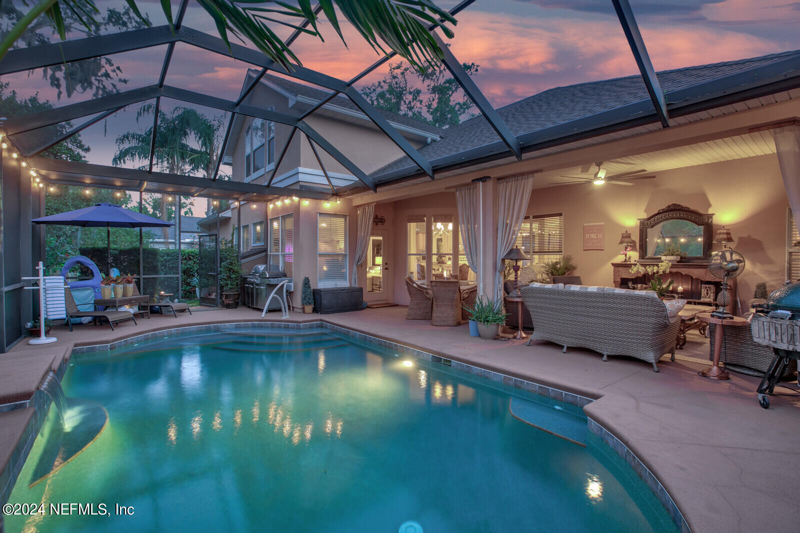 a view of a swimming pool with a patio