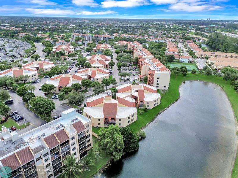 an aerial view of a city with lots of residential buildings