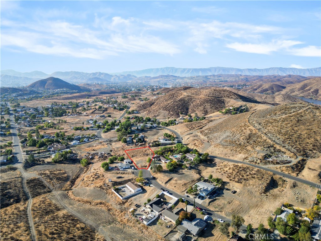 an aerial view of residential house and outdoor space