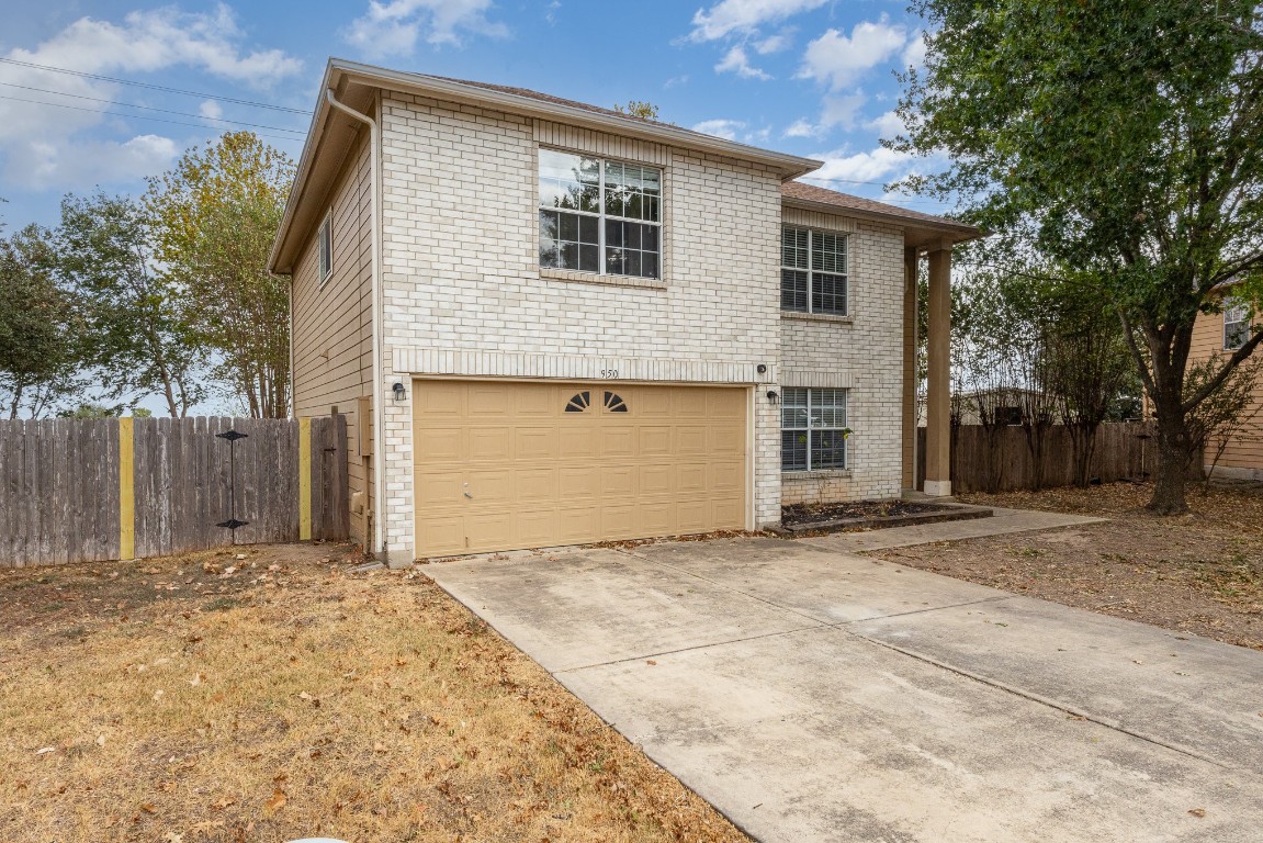 a view of a house with a garage