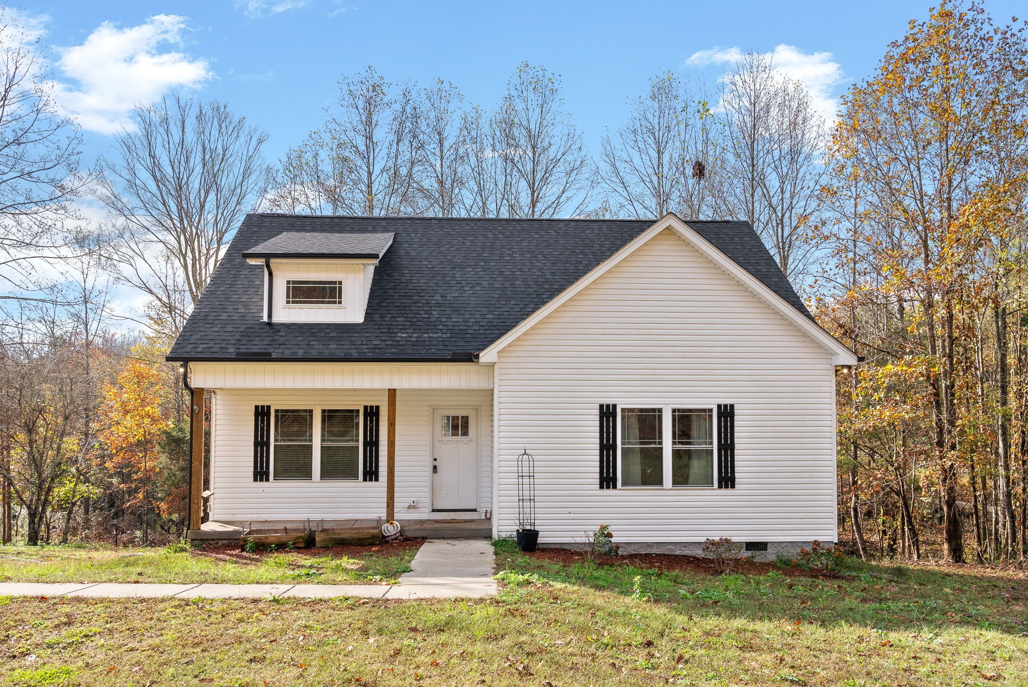 a view of front a house with a yard