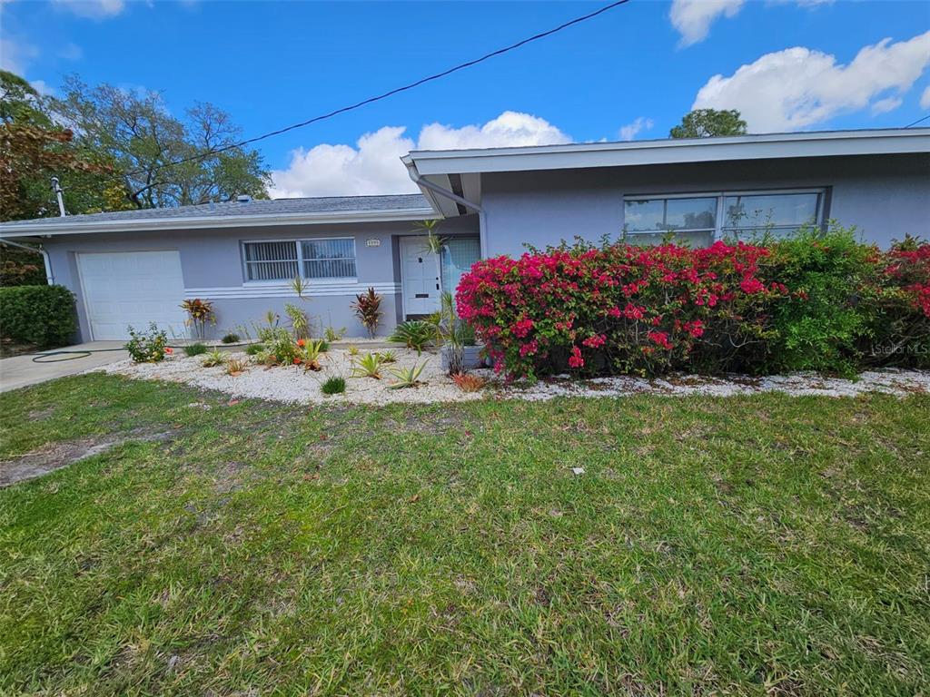 a front view of house with yard