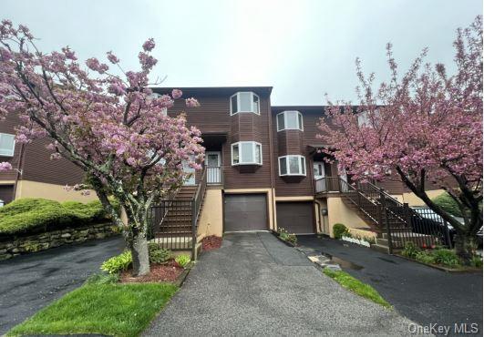 View of front of home featuring a garage