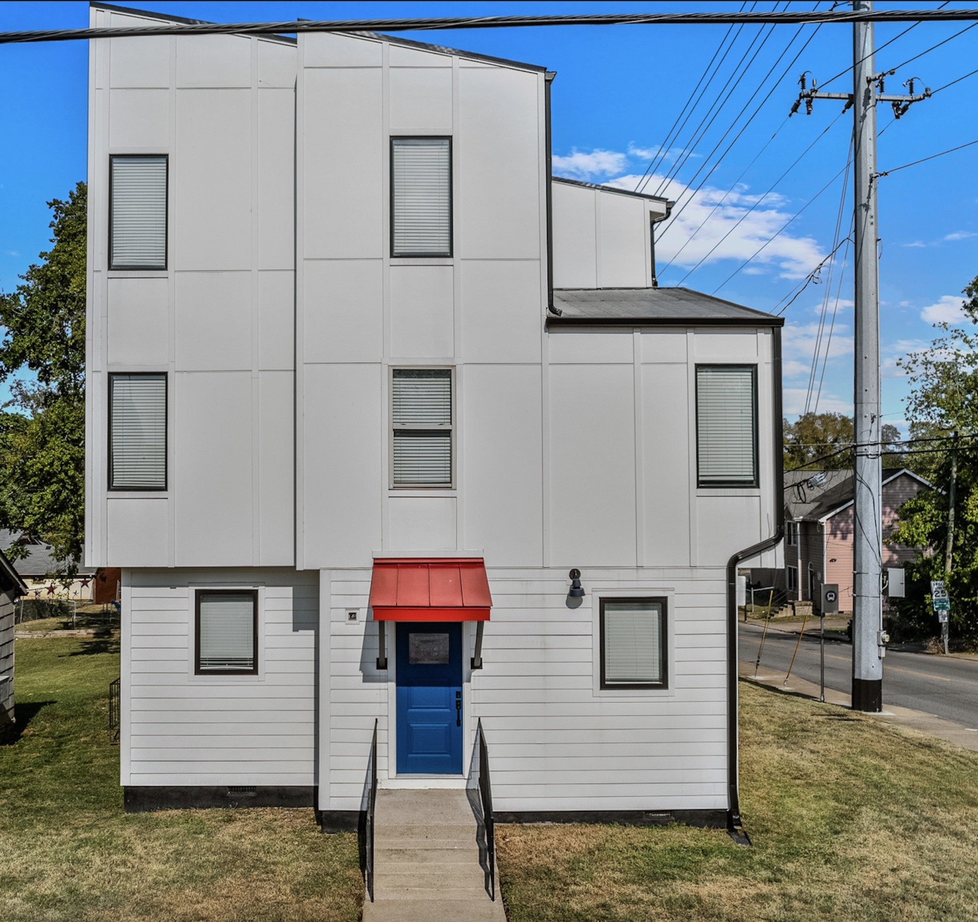 a view of a house with large windows