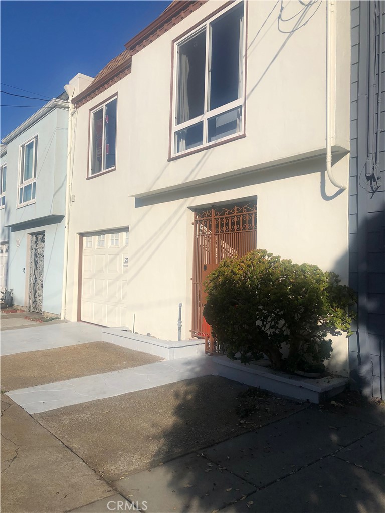 a view of a house with a street