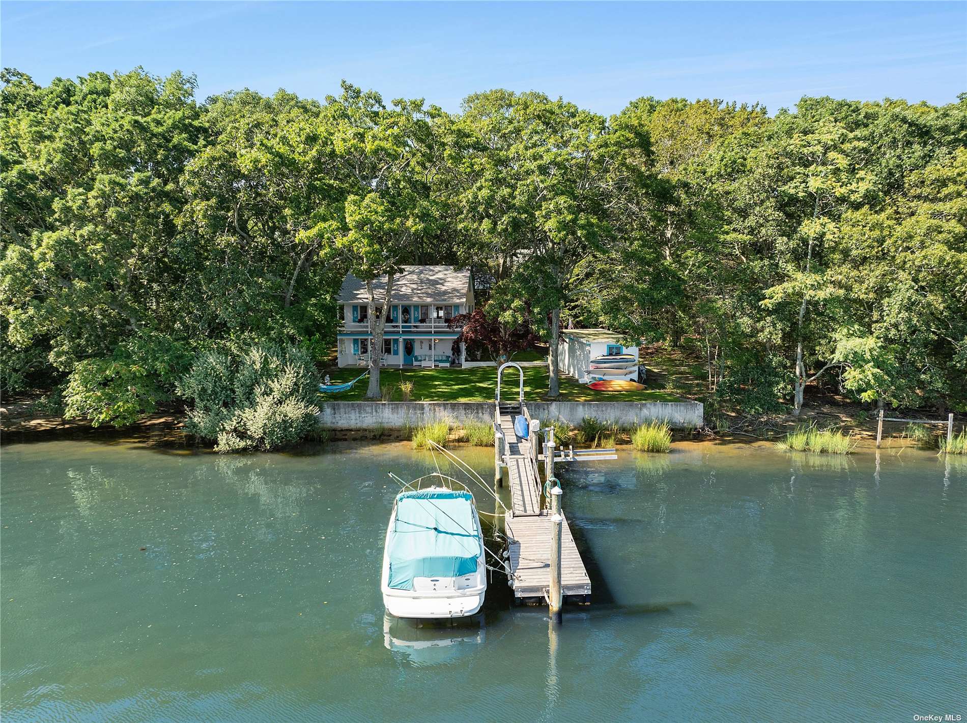 a view of a lake with a car parked