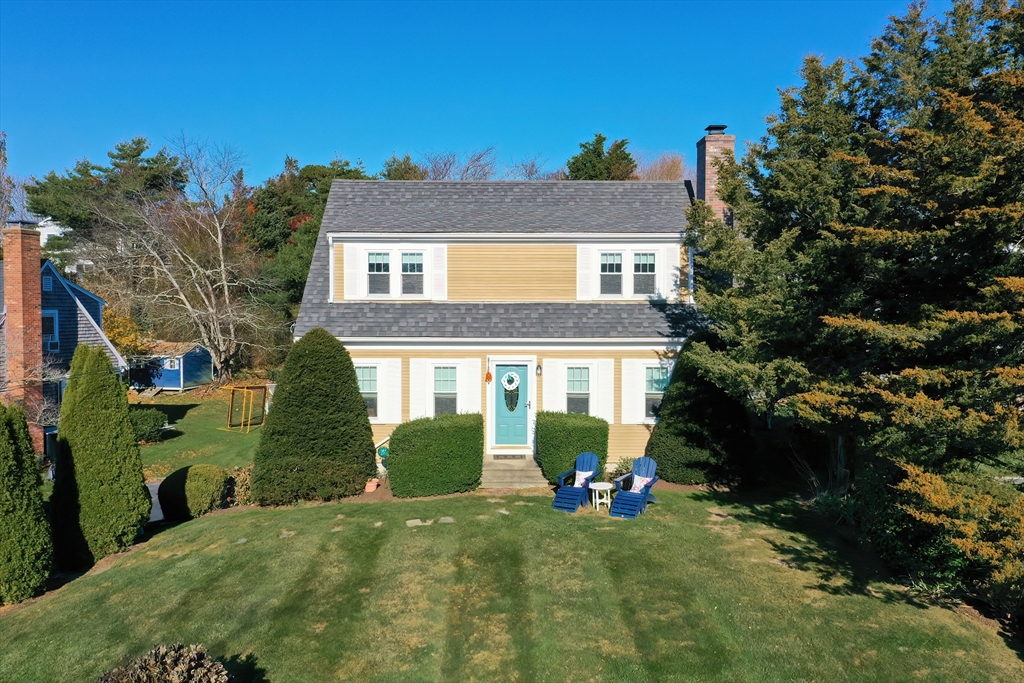 a view of a house with a garden