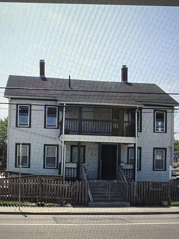 a front view of a house with a garage