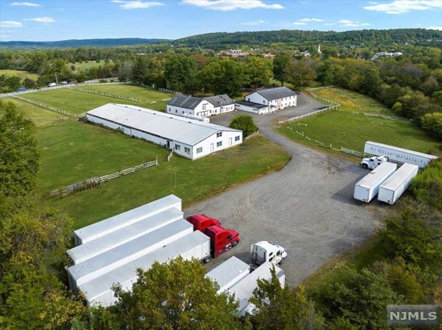 an aerial view of a house with a garden