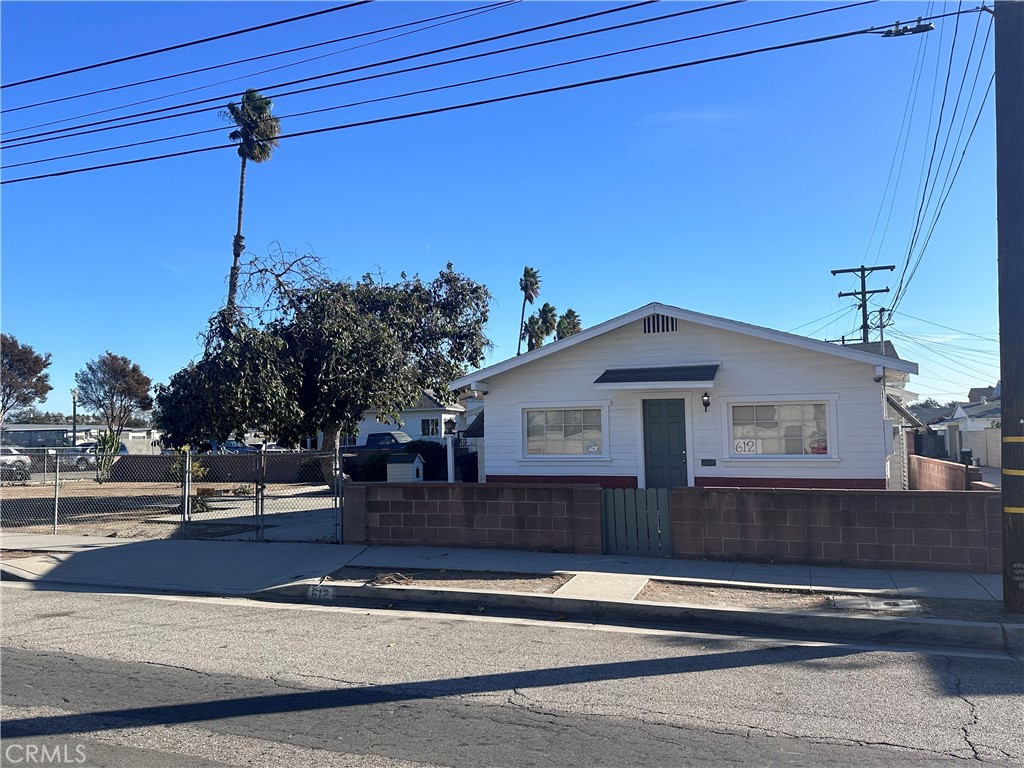 a view of a house with a street