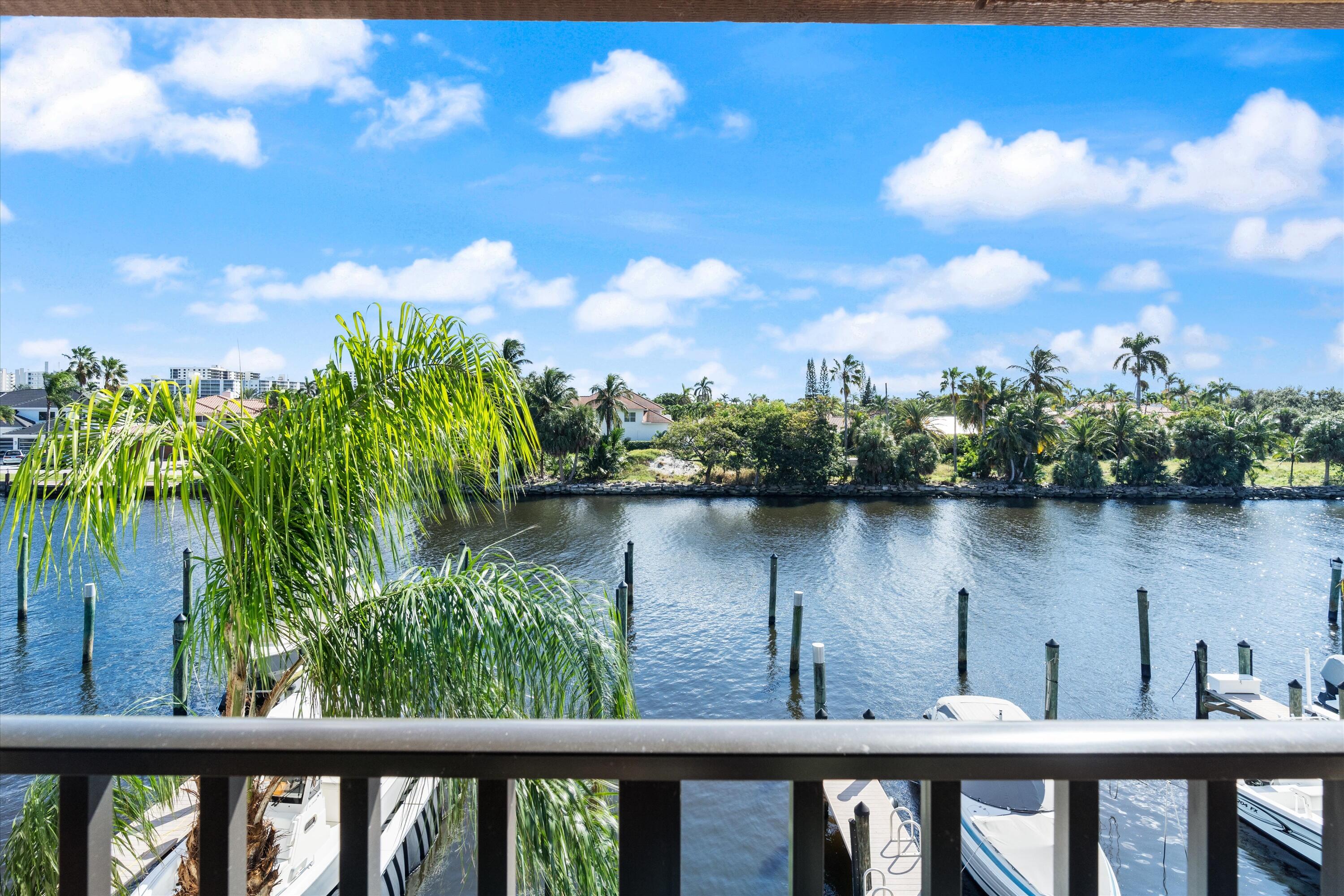 a view of a lake from a balcony