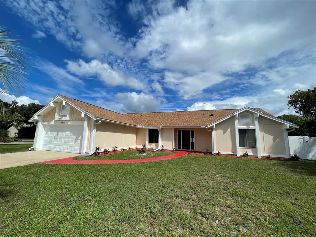 a front view of house with yard