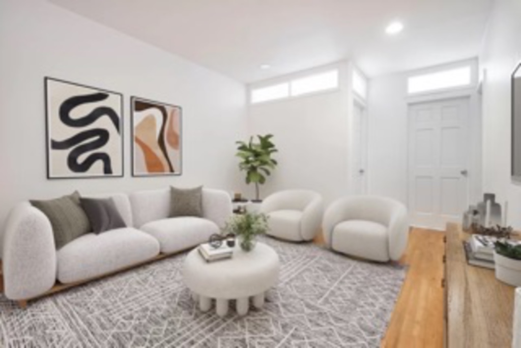 a living room with furniture and wooden floor