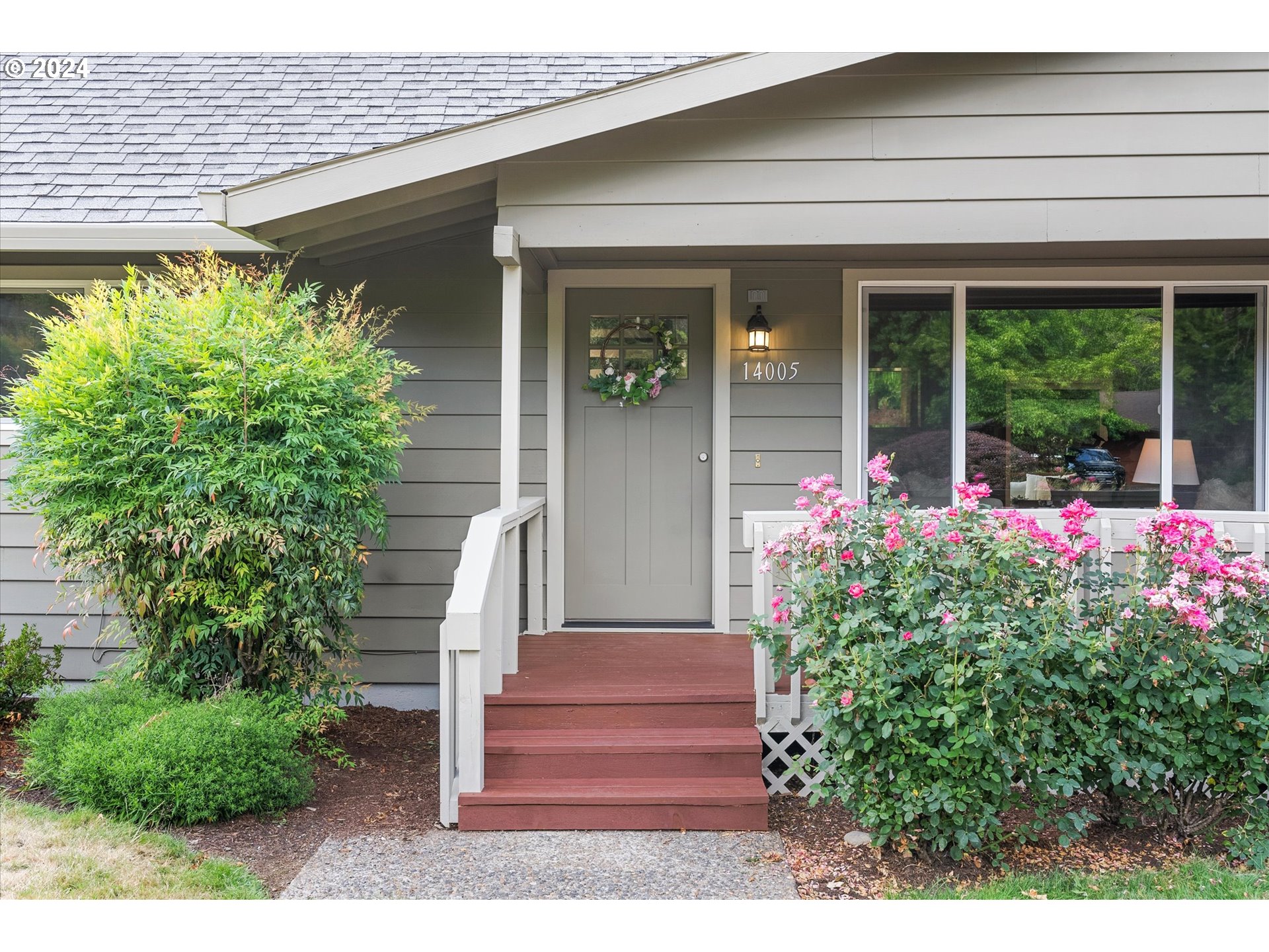 a front view of a house with a porch