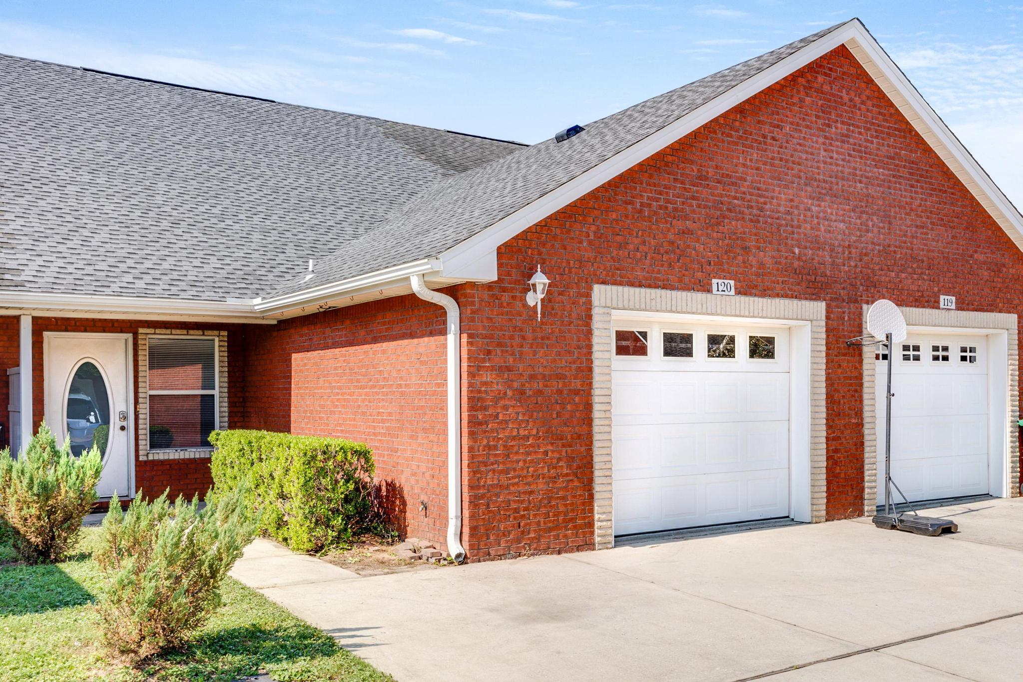 a front view of house with yard