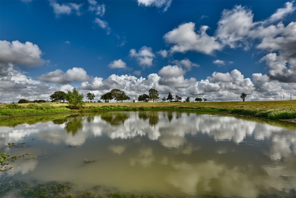 a view of a lake with outdoor space