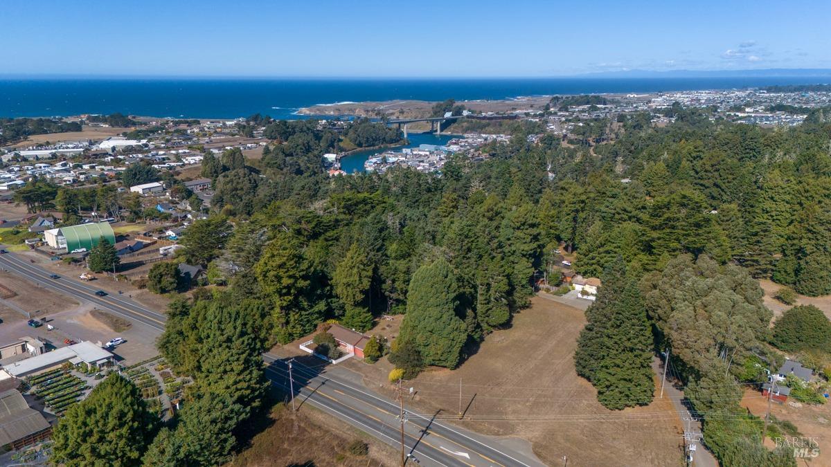 an aerial view of residential house and outdoor space