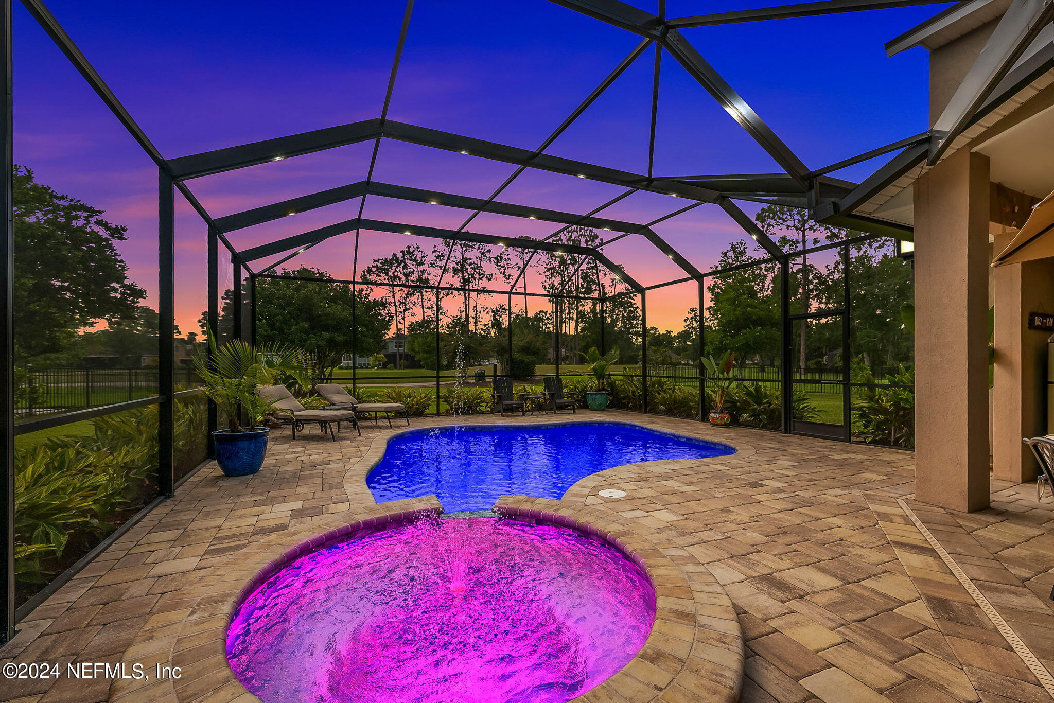 a view of swimming pool with a patio