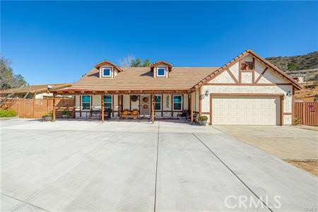 a front view of a house with a garage