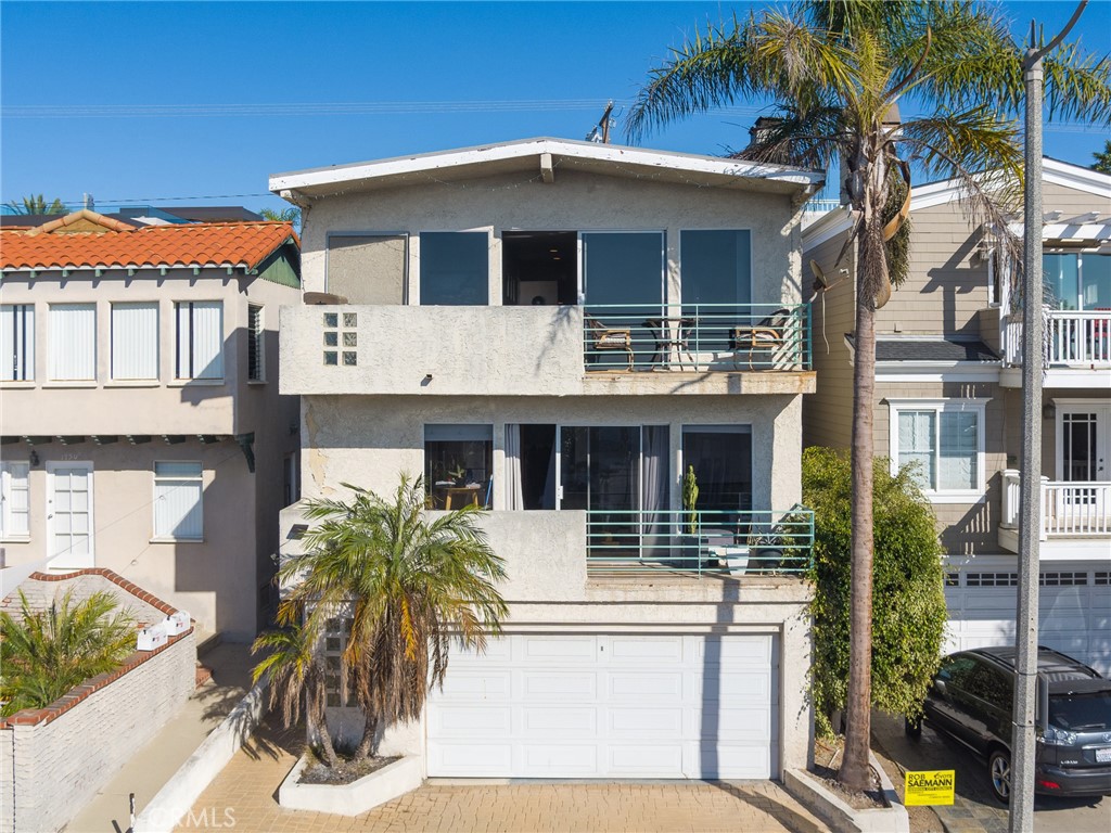 a front view of a house with balcony