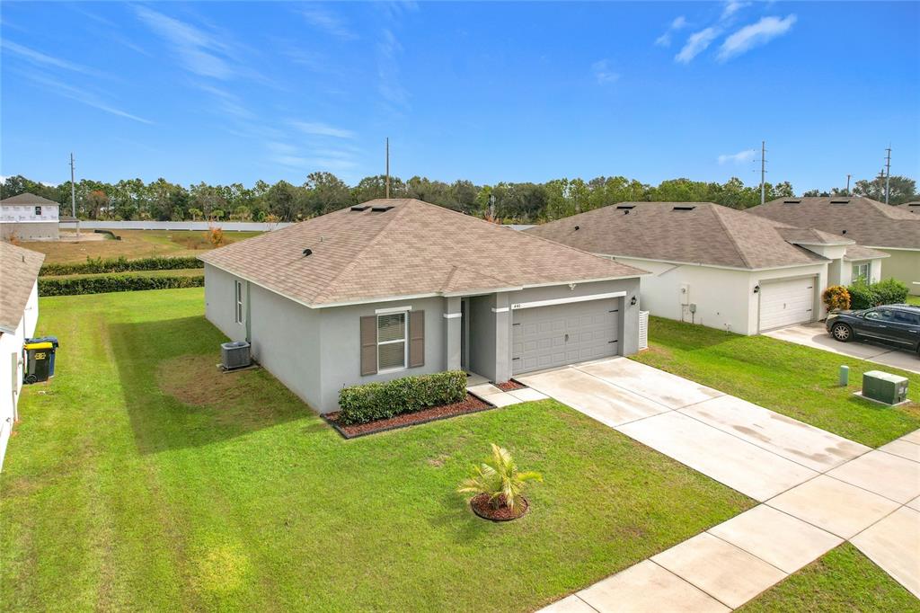 a view of a house with a big yard