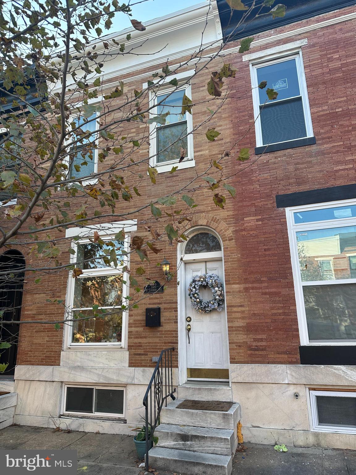 a front view of a building with windows