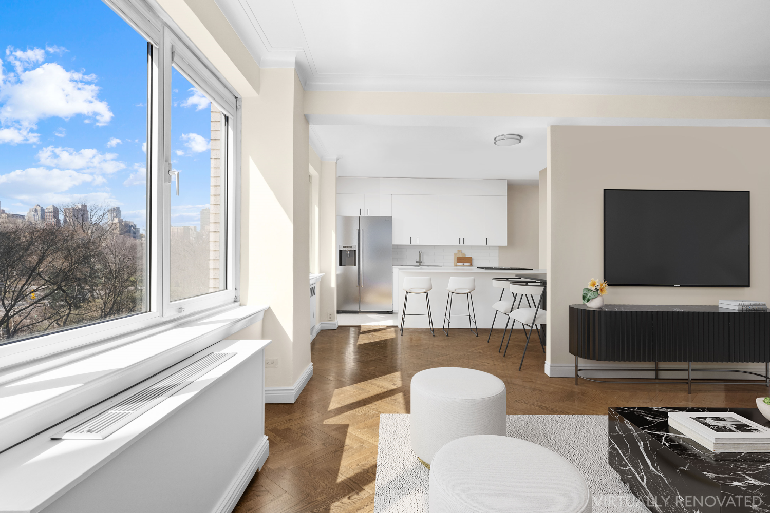 a living room with furniture and a flat screen tv