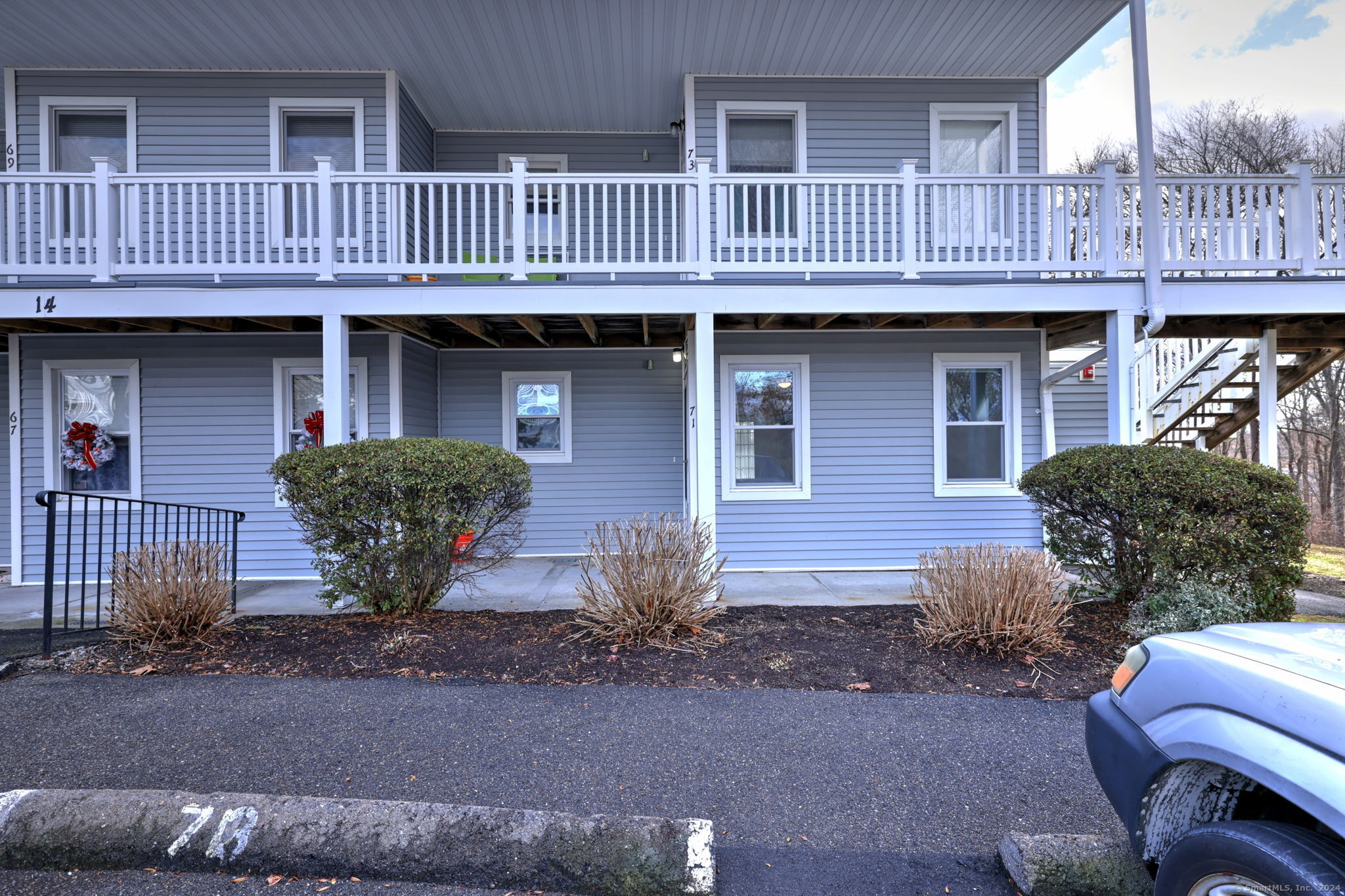 a front view of a house with garden