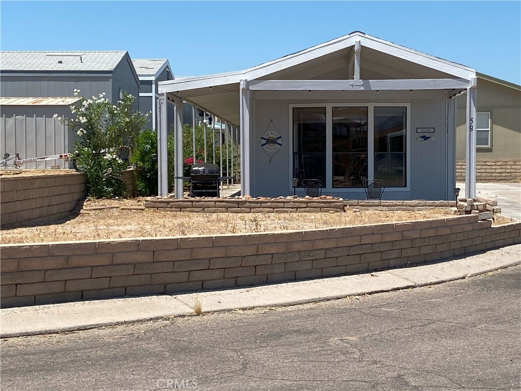 a view of house with outdoor space