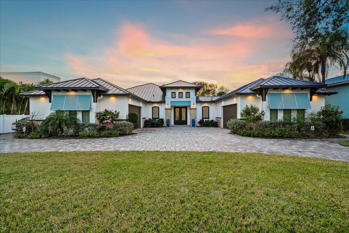 front view of a house with a yard