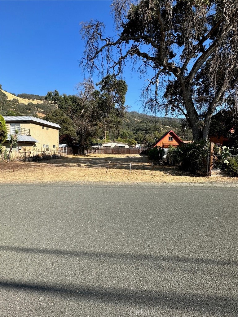 a view of street with houses