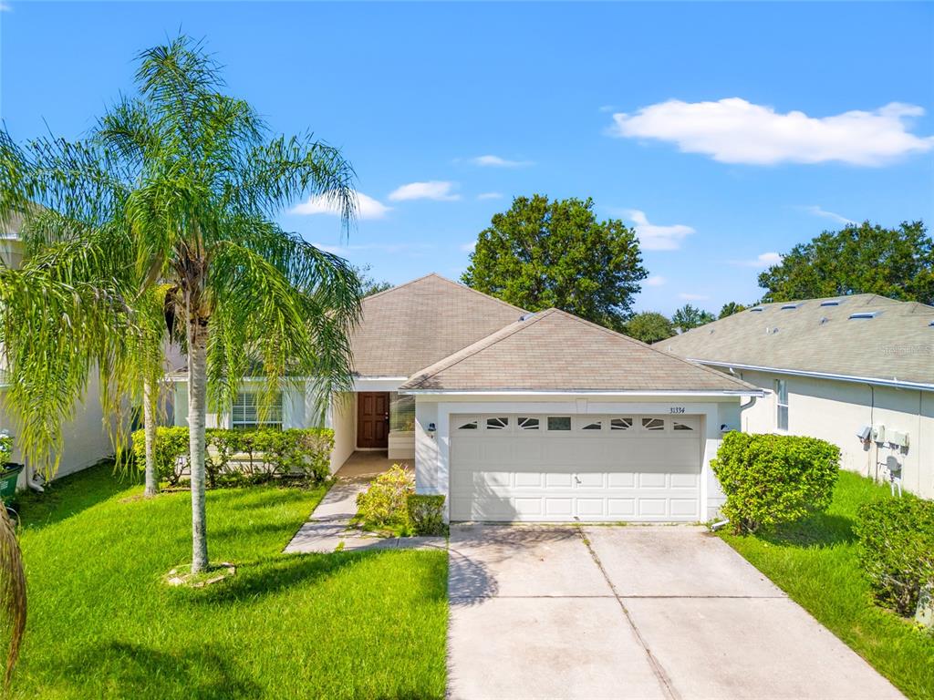 front view of a house with a yard