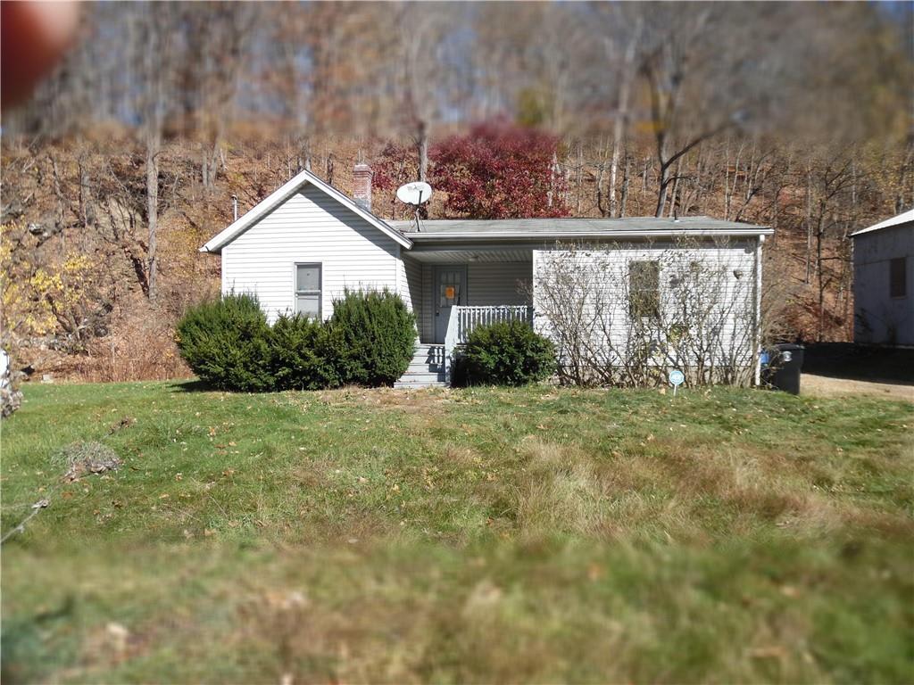 a view of a house with garden