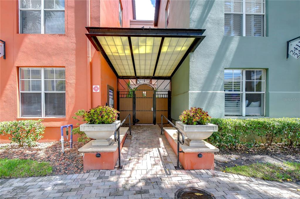 a front view of a house with outdoor seating