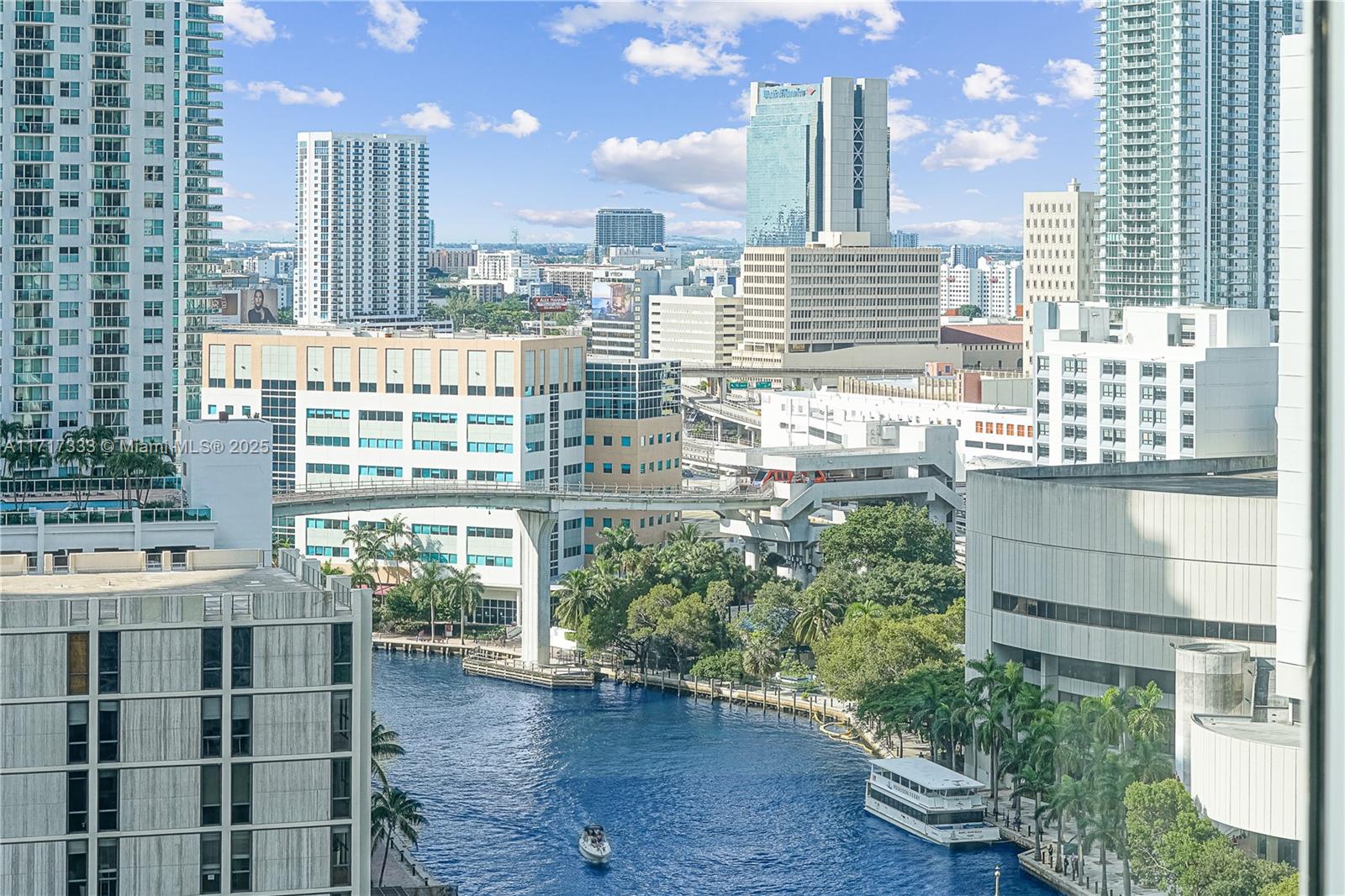 a view of a city with tall buildings