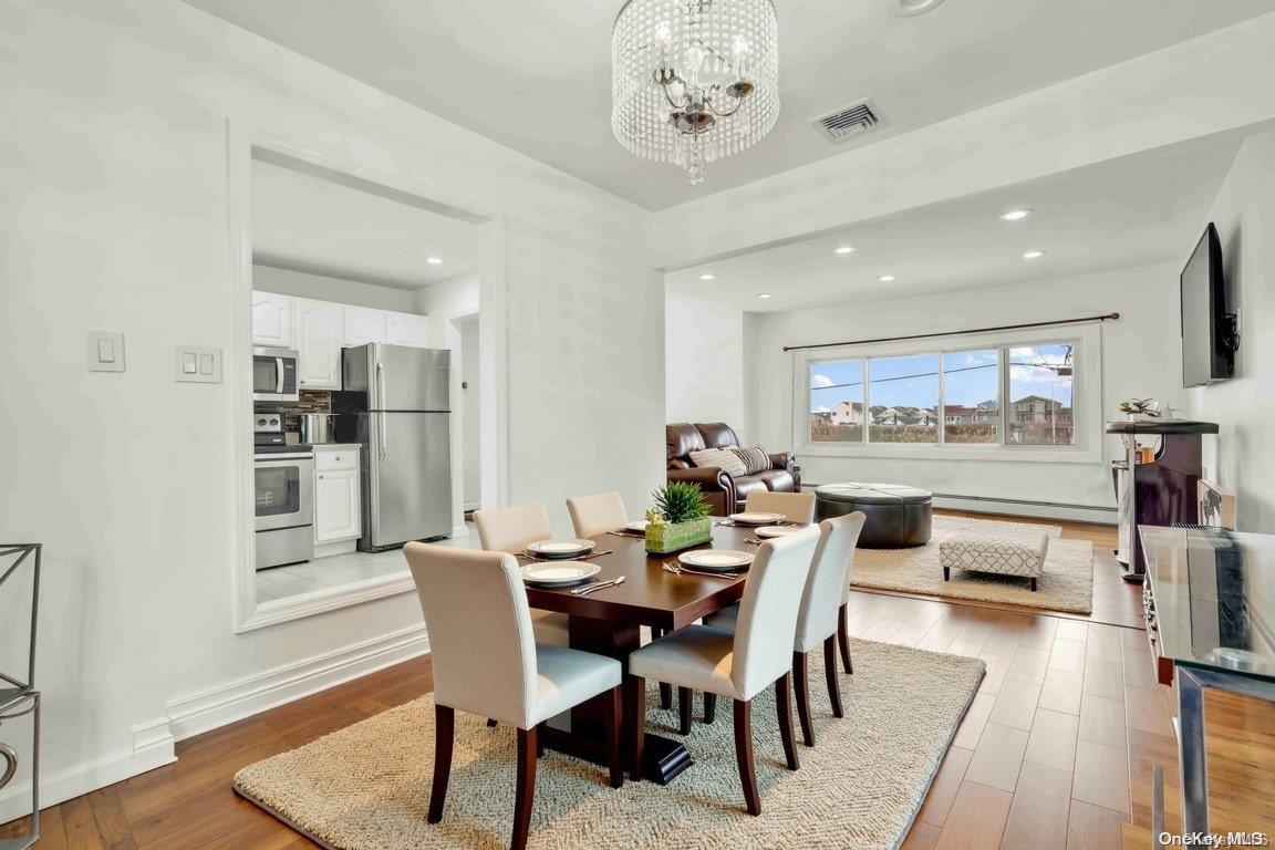 a view of a dining room with furniture