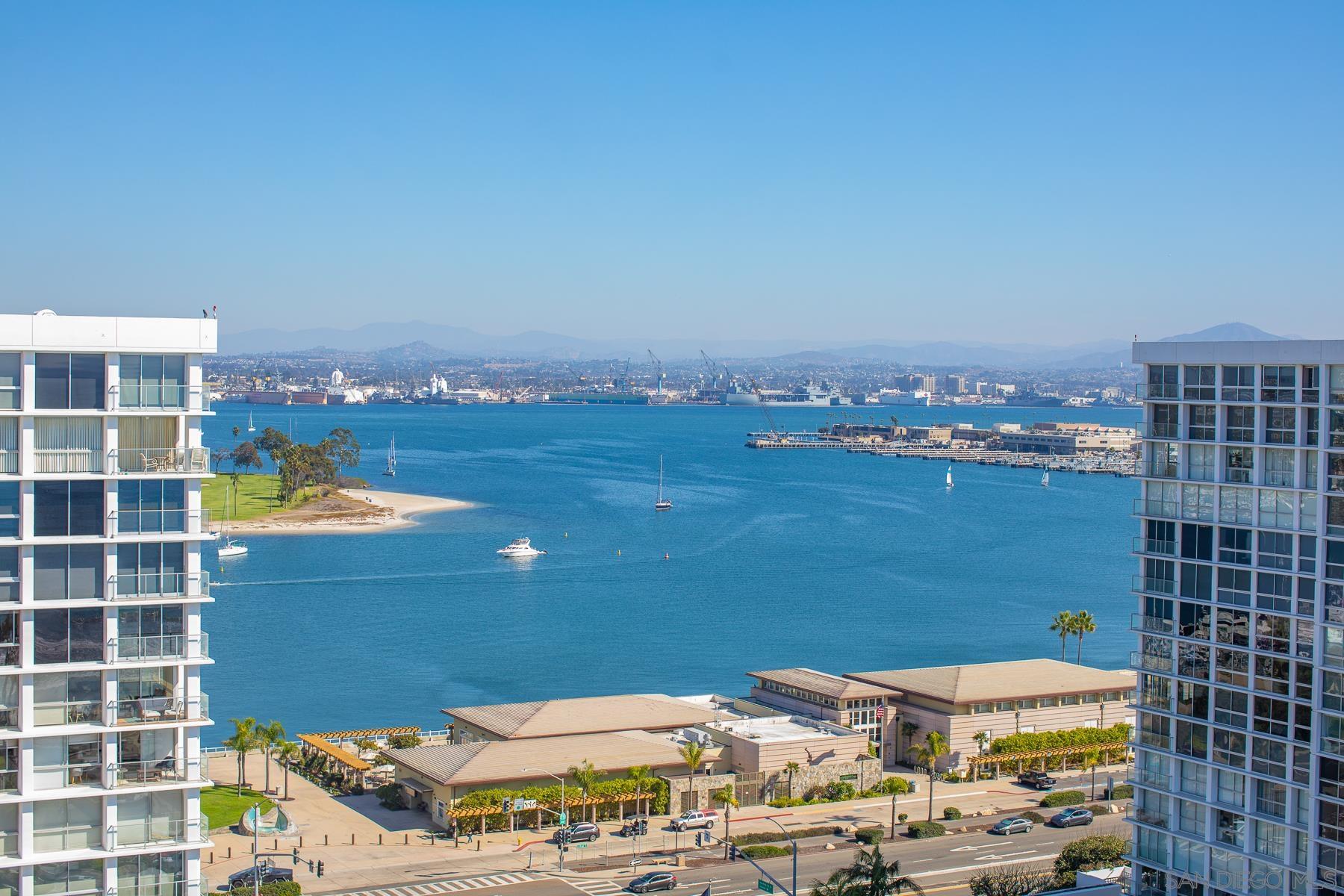 a view of city with ocean