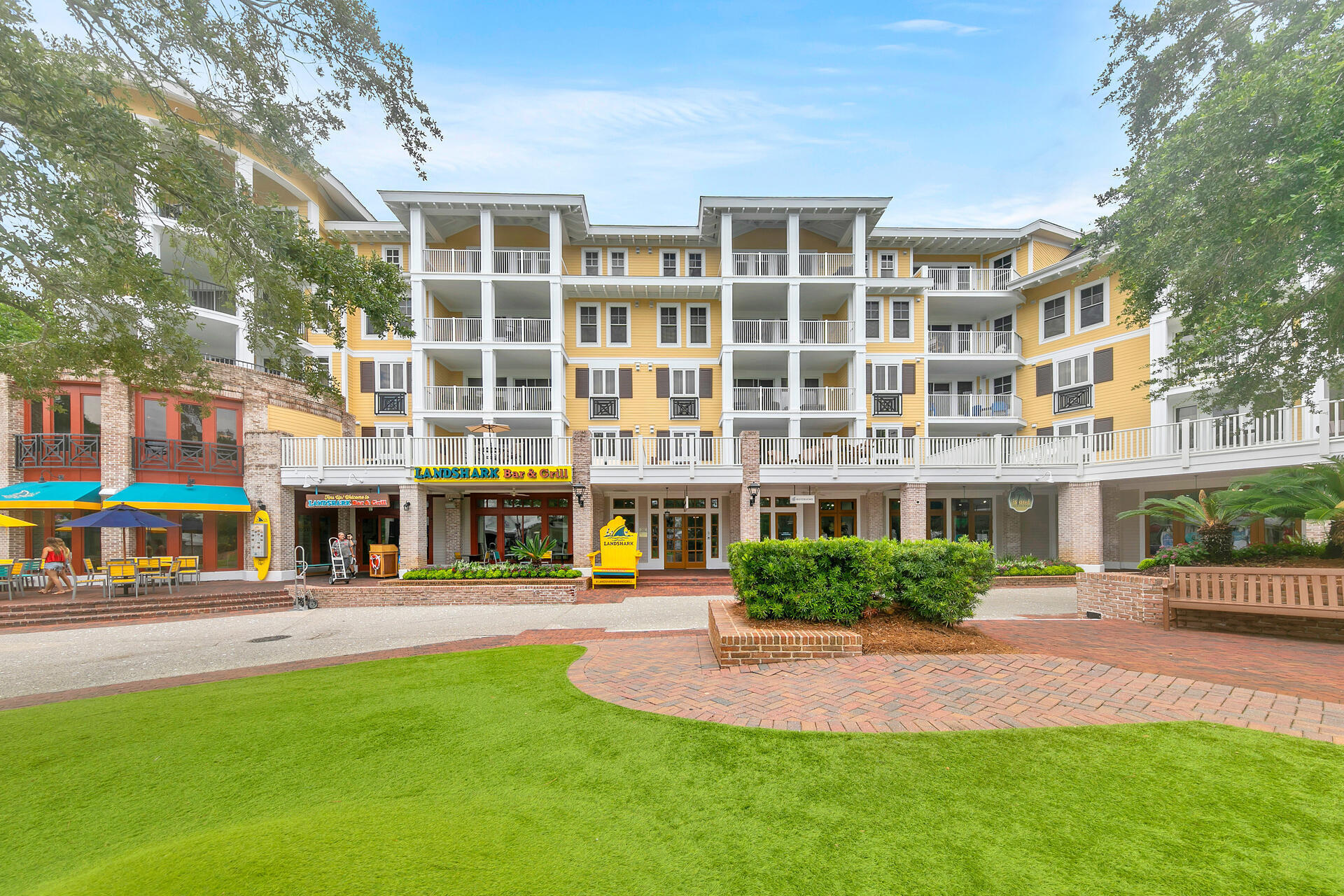 a front view of building with yard