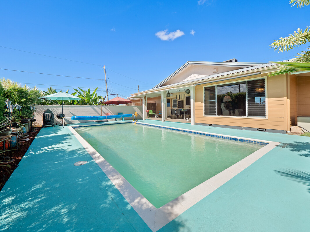 a view of a house with a swimming pool