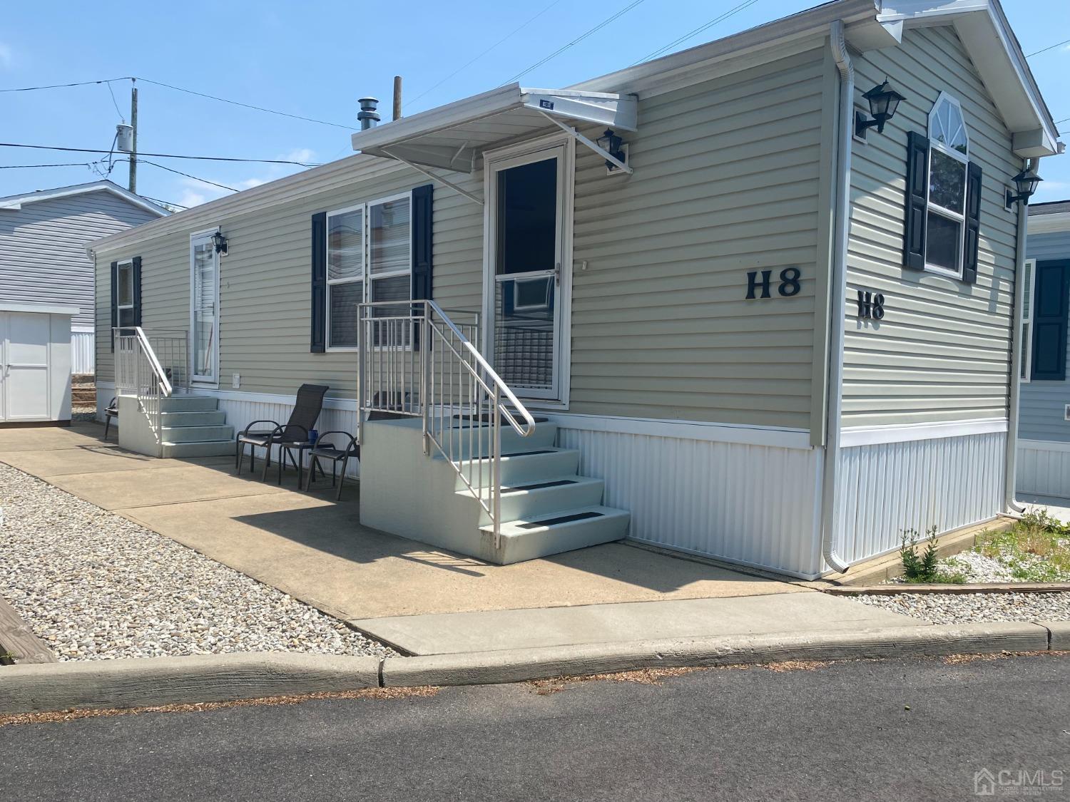 a view of a house with a street