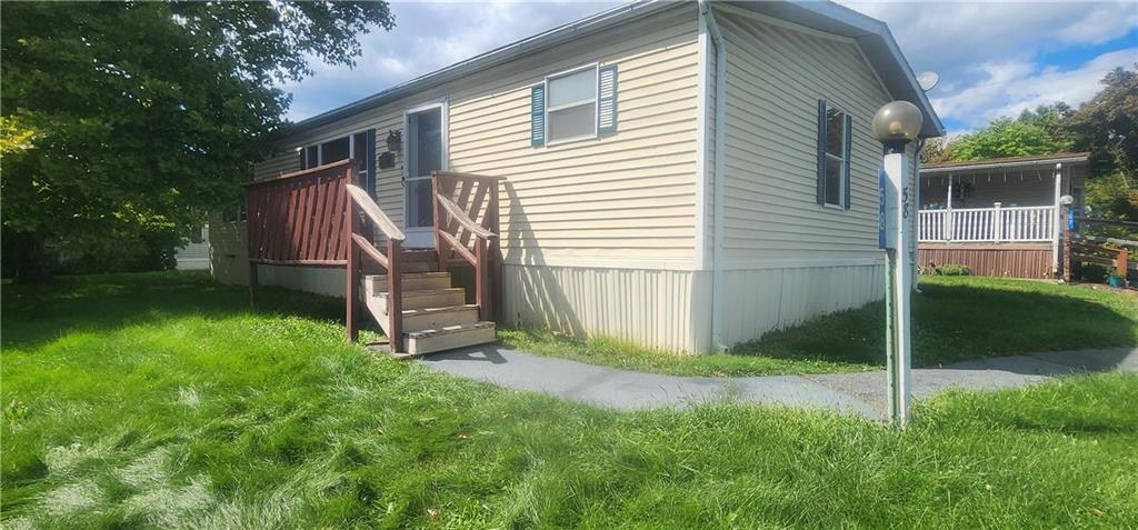 a view of a back yard of the house