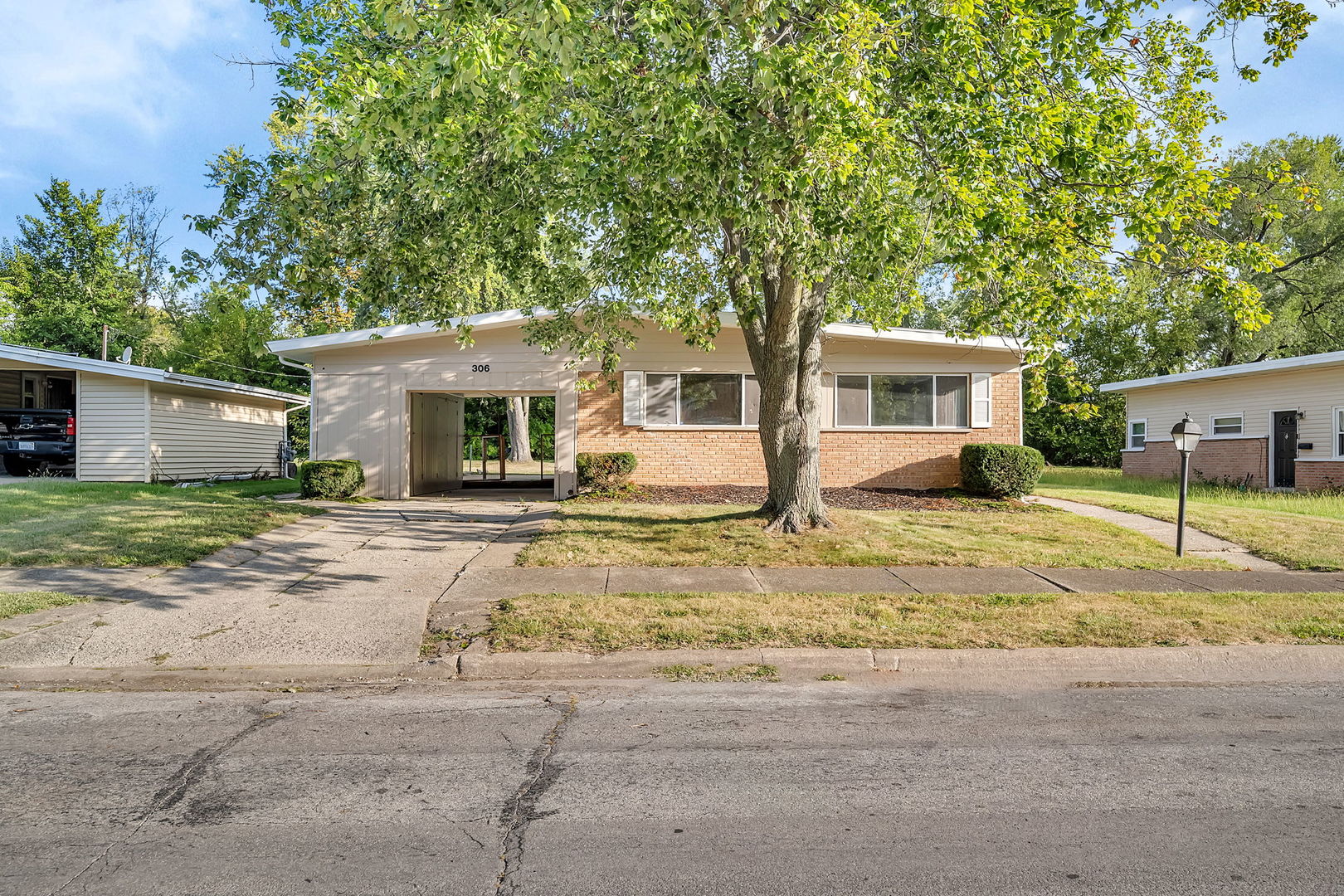 front view of a house with a patio