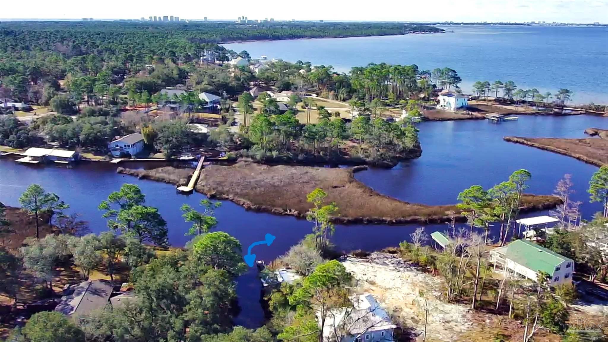 an aerial view of lake residential house with outdoor space