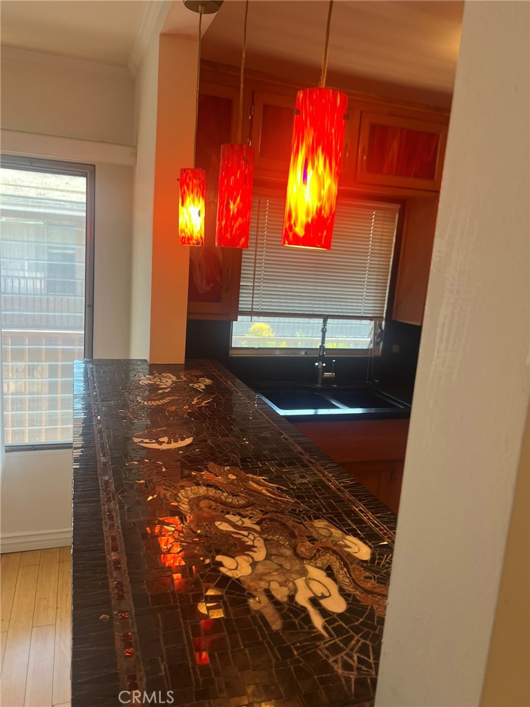 Custom mosaic bar with two dragons and custom pendant lights