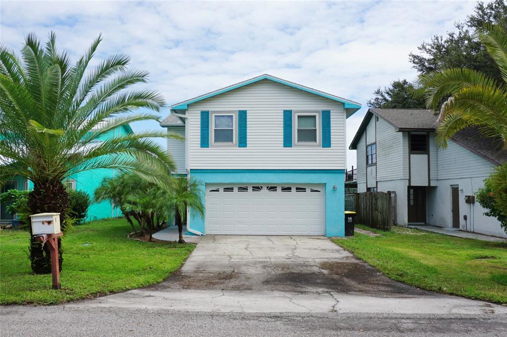 a front view of house with yard