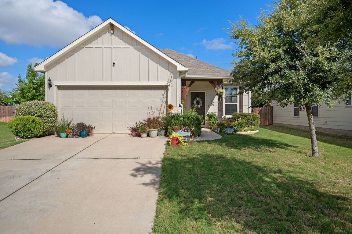 a view of garage and yard