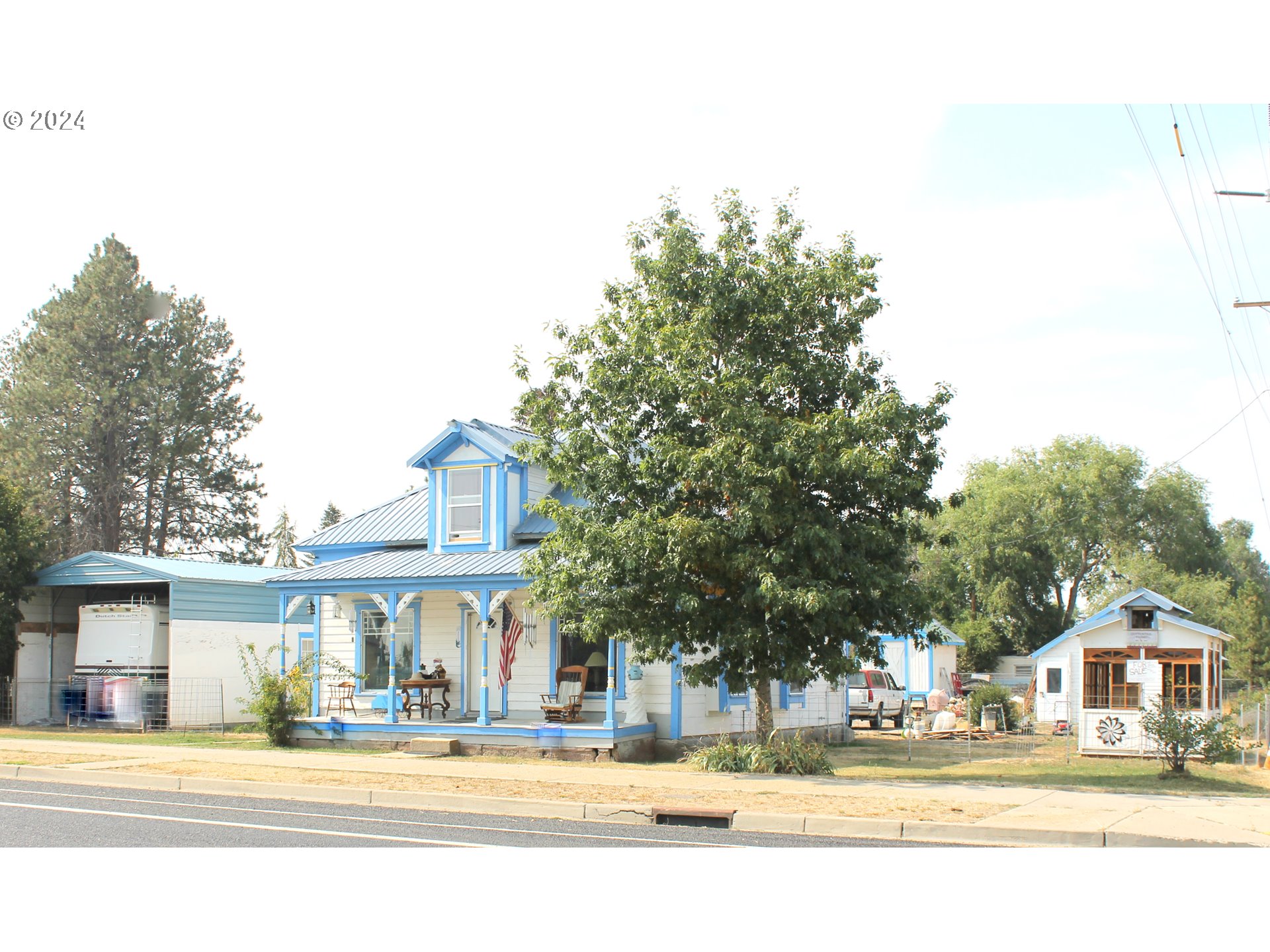 a front view of a building with street view