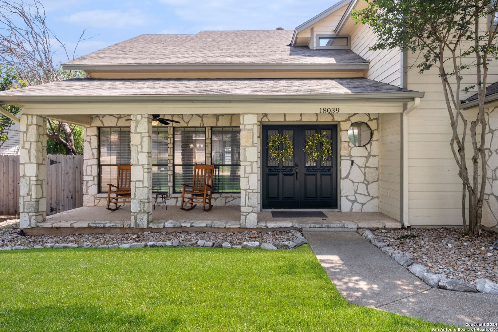 a front view of house with yard