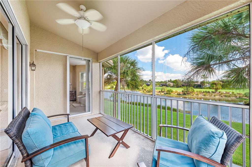 a view of a balcony with furniture